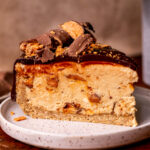 One slice of butterfinger pie on a plate.