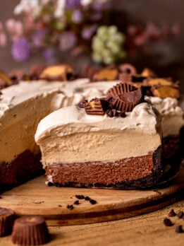 Close up of one slice of chocolate peanut butter pie.