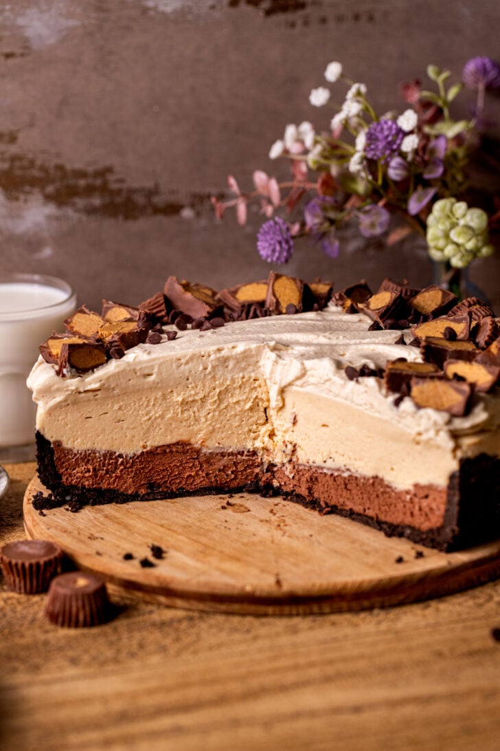 Cut open pie on a wood board.