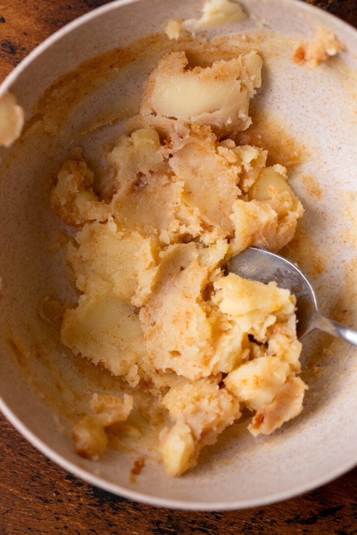 Softened browned butter in a bowl.