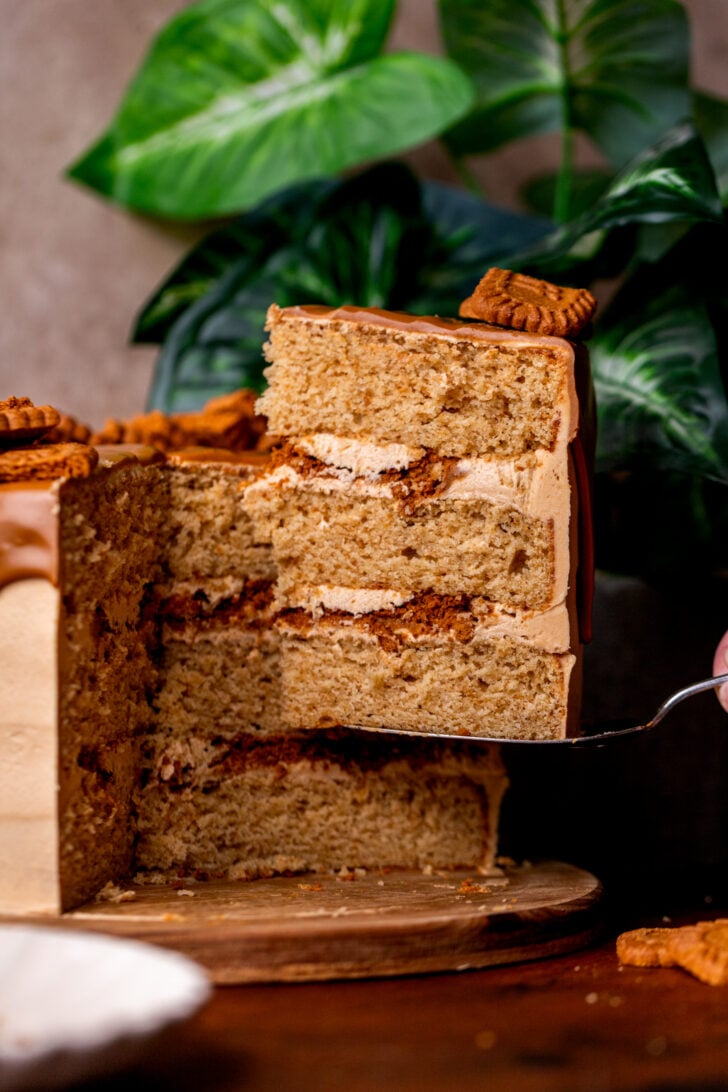 Taking a slice out of the biscoff cookie butter cake.