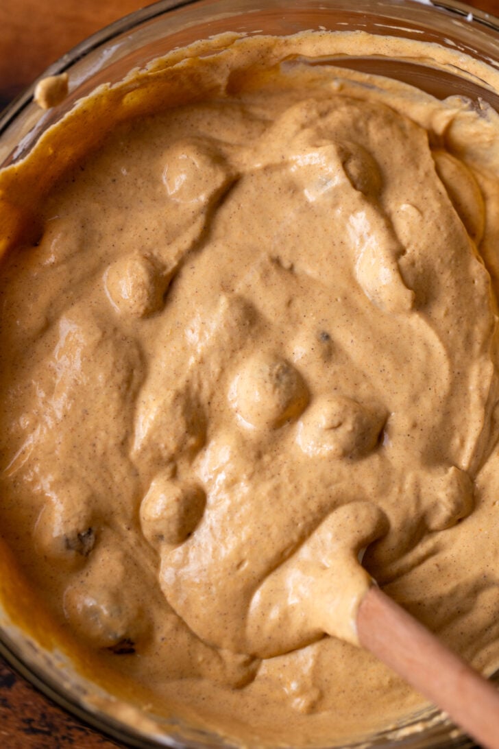 Pumpkin cheesecake batter in a bowl.