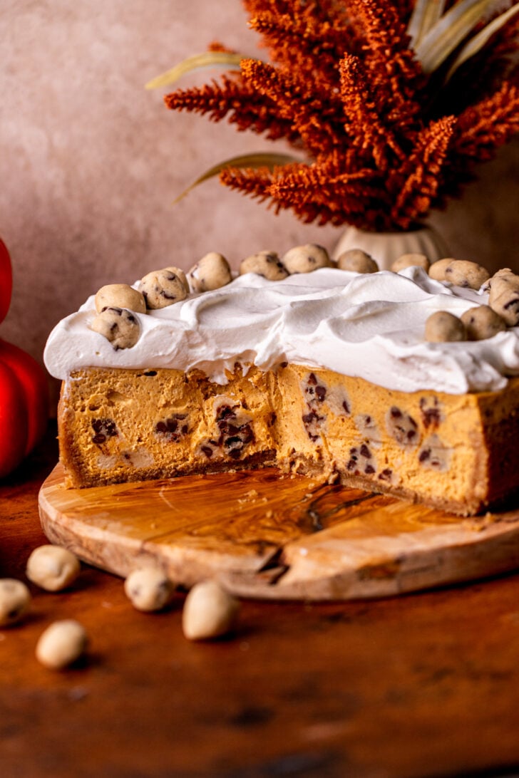 Pumpkin cookie dough cheesecake cut open.