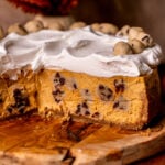 Close up of the side of the pumpkin cookie dough cheesecake.