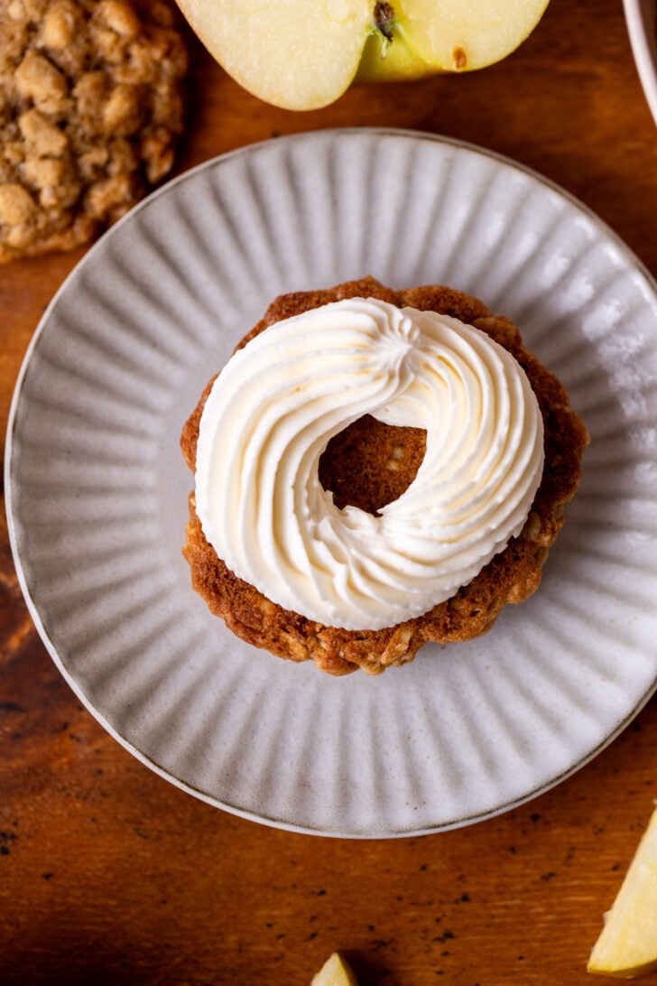 Frosting piped on top of cookie.