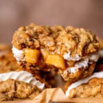 A bite missing from apple oatmeal cream pies.