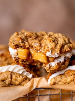 A bite missing from apple oatmeal cream pies.