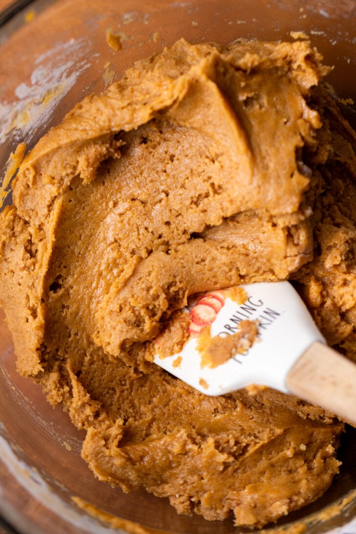 Pumpkin cookie dough in a bowl.