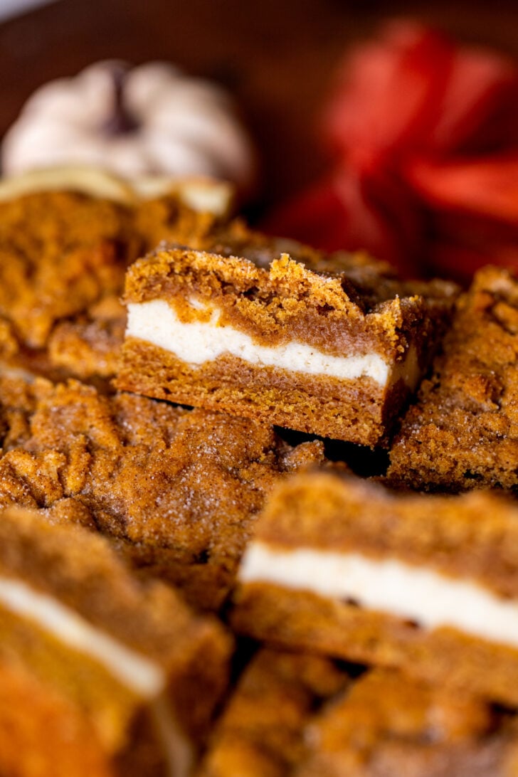 One cookie bar on its side, showing the filling.