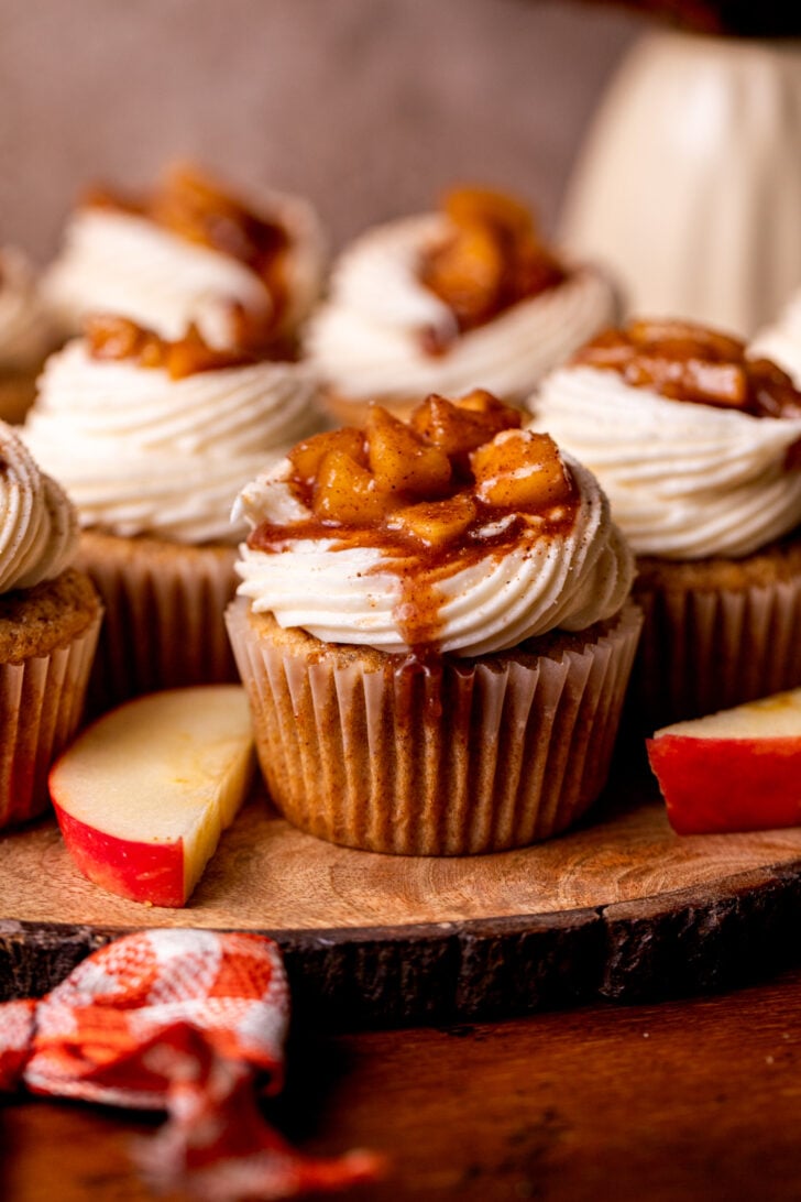 Cupcakes on a wood board.
