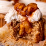 Bite missing from apple pie cupcakes.