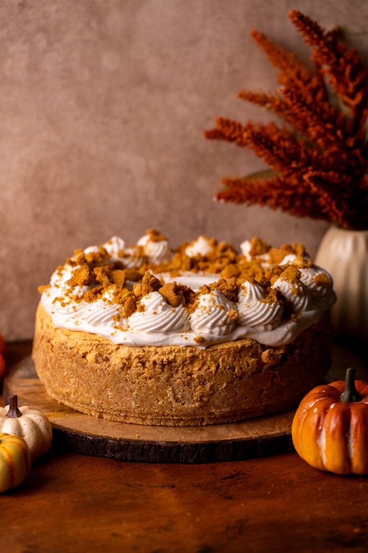 Decorated pie on a wood board.