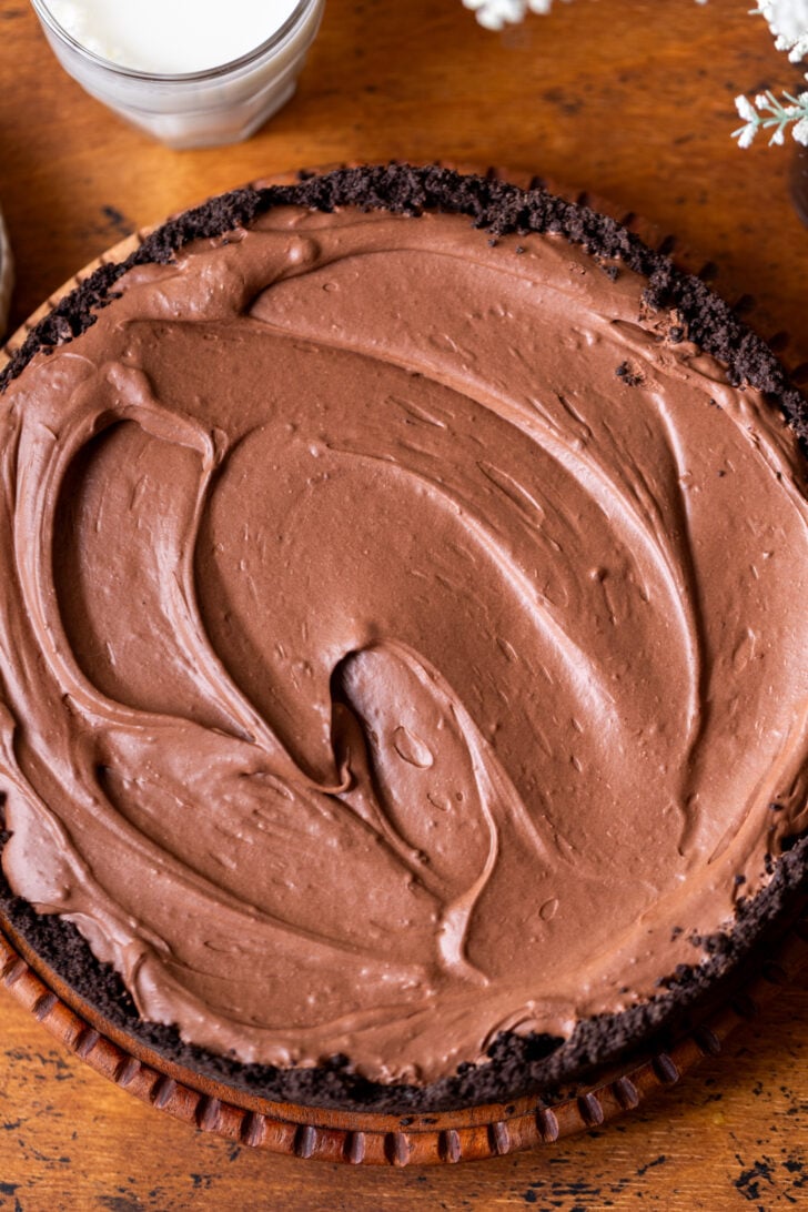 Chilled pie on a wood platter.