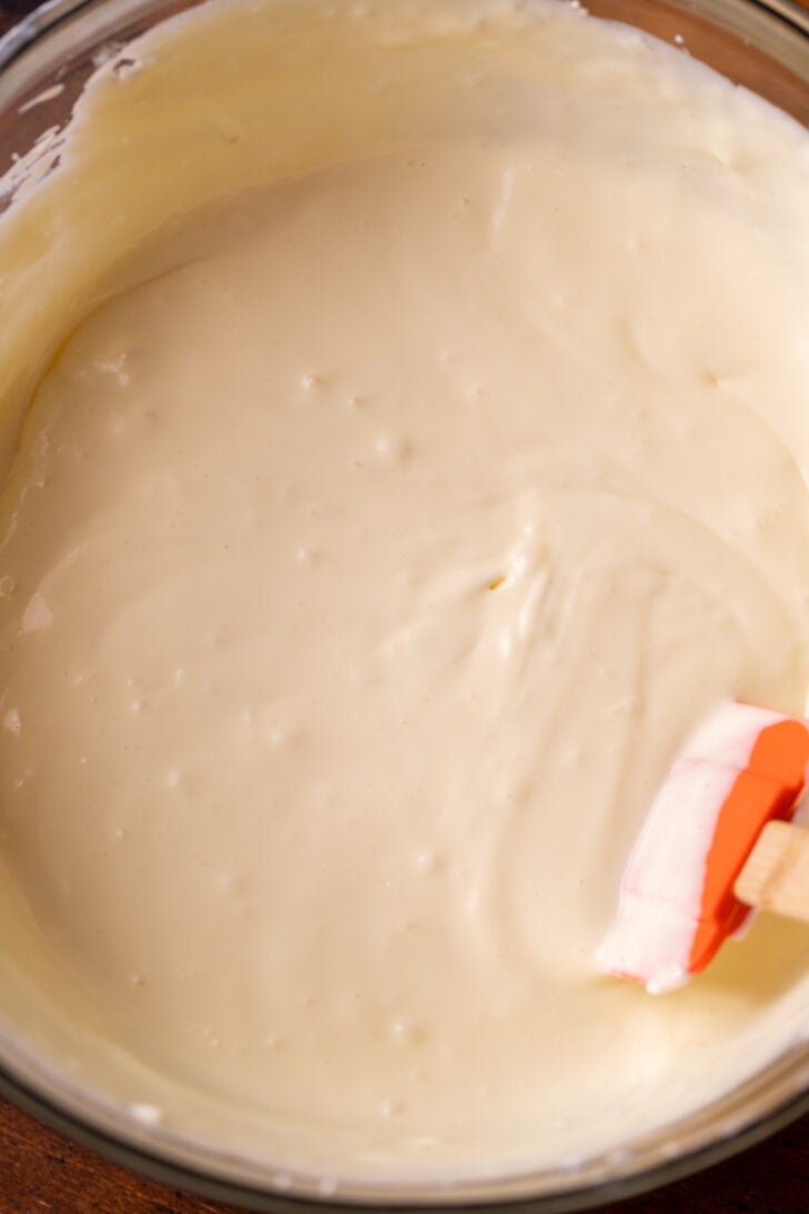 Regular cheesecake batter in a bowl.